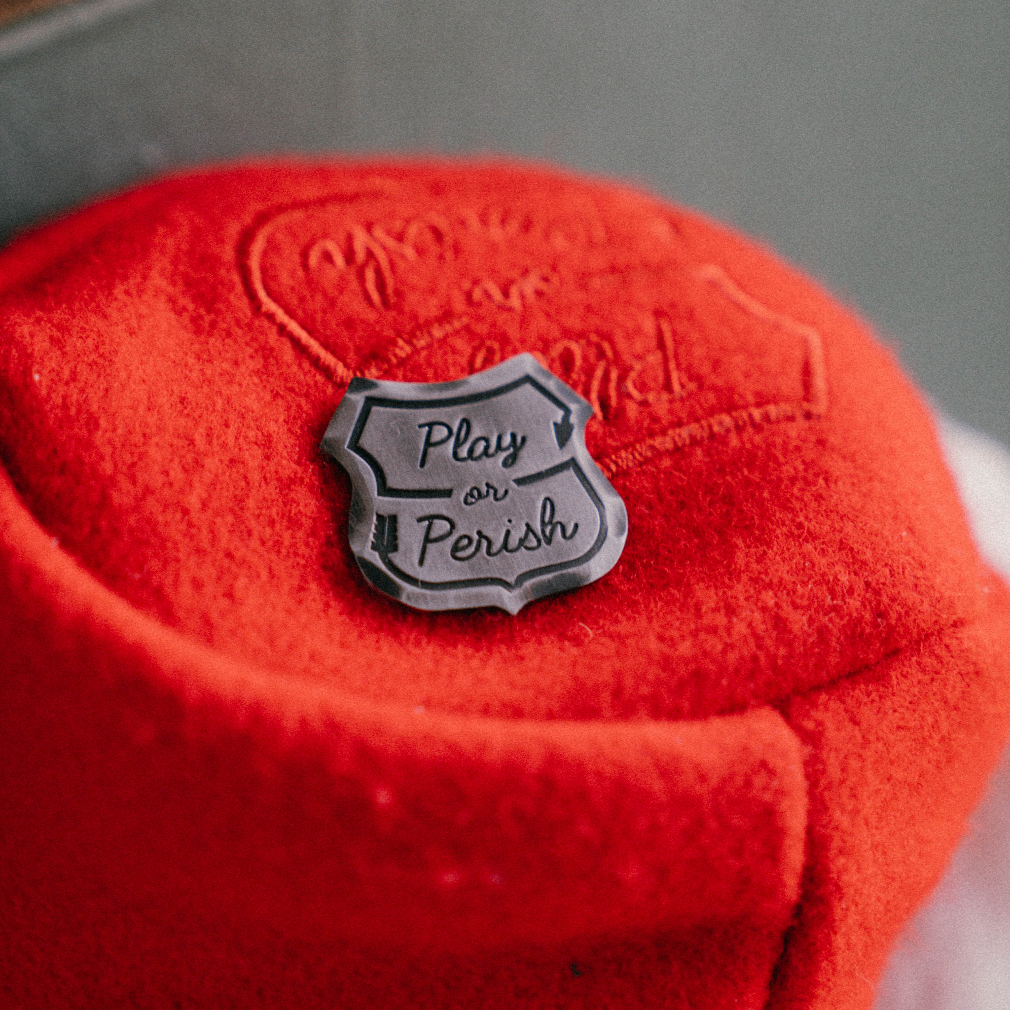 Play or Perish Ball Mark